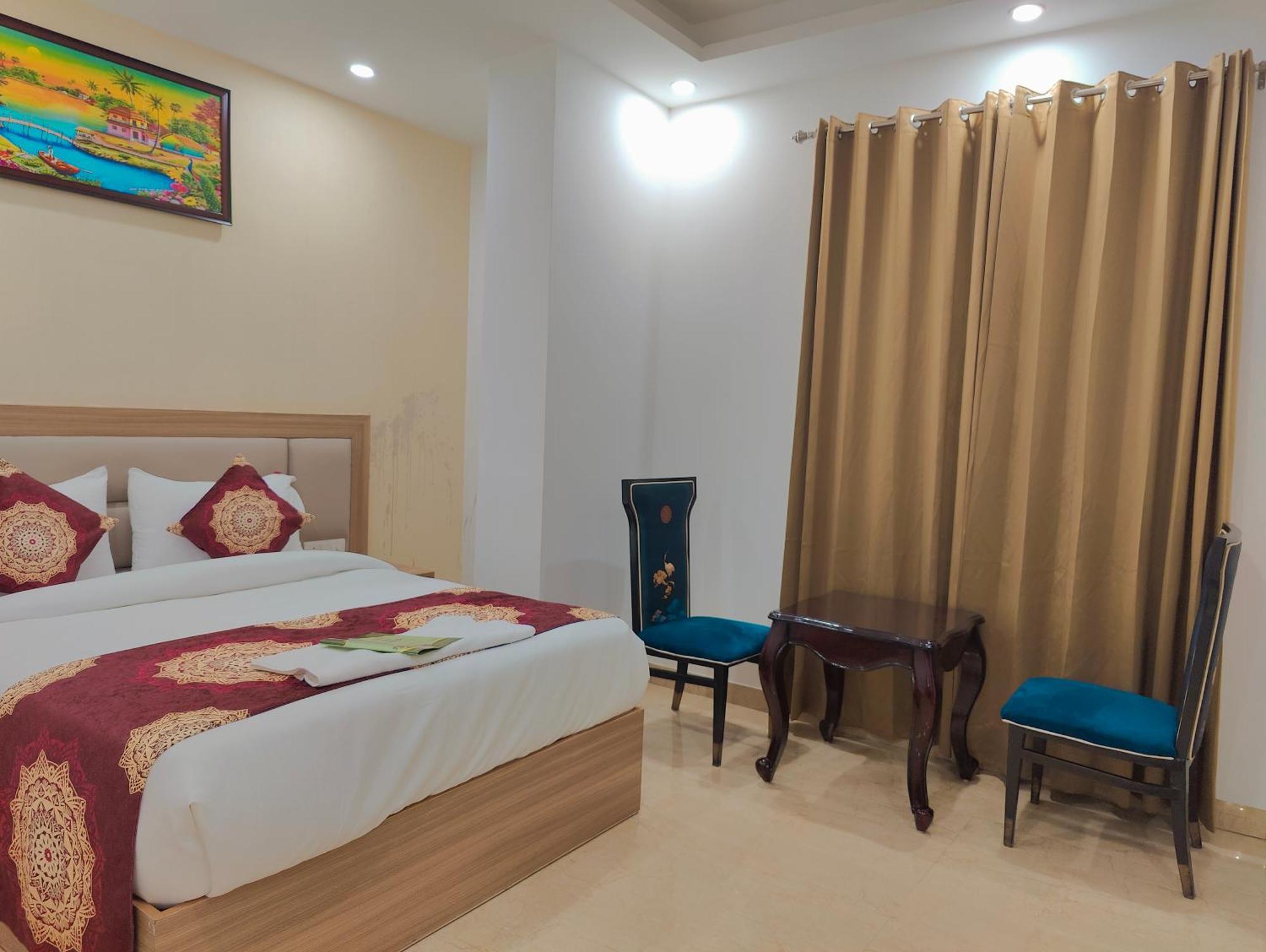 Decent Suites Inn- Mahipalpur, Delhi Airport, Aerocity Couette-café